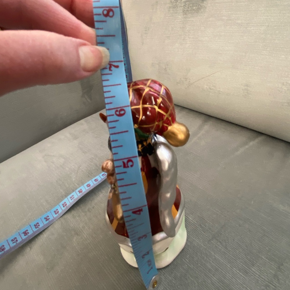 Cheerful Ceramic Snowman Figurine with Gold and Red Accents, Dangling Stars - Picture 9 of 9